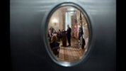 Vice President Joe Biden, seen through a window in the Butlers’ Pantry, addresses a bipartisan group of governors in the State Dining Room of the White House, Feb. 28, 2011. (Official White House Photo by Pete Souza)